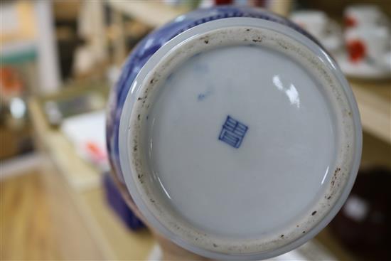 An Asian blue and white inverted pyriform jar and cover, a similar pair of smaller vases and two other items, H 25cm (largest)